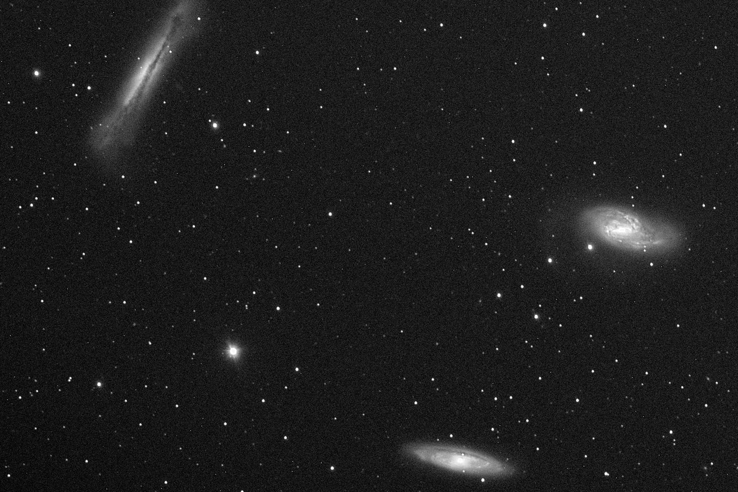 Галактики М65 и М66 и NGC 3627 в созвездии Льва